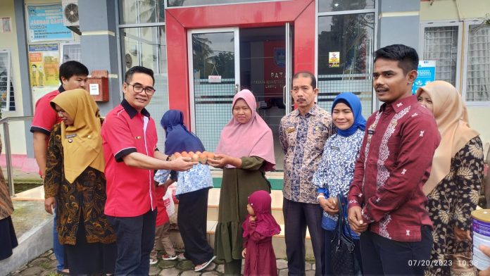 Bersama Wali Kota Payakumbuh, HBT Salurkan Bantuan Stunting Di Kecamatan Latina